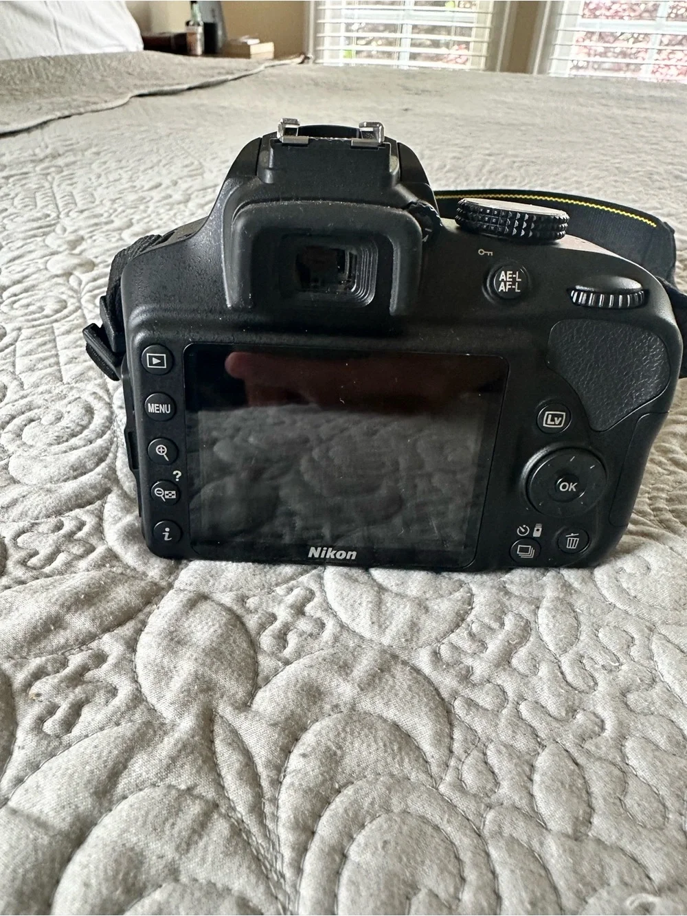 Nikon D3400 DSLR Camera in Black with Black Lens